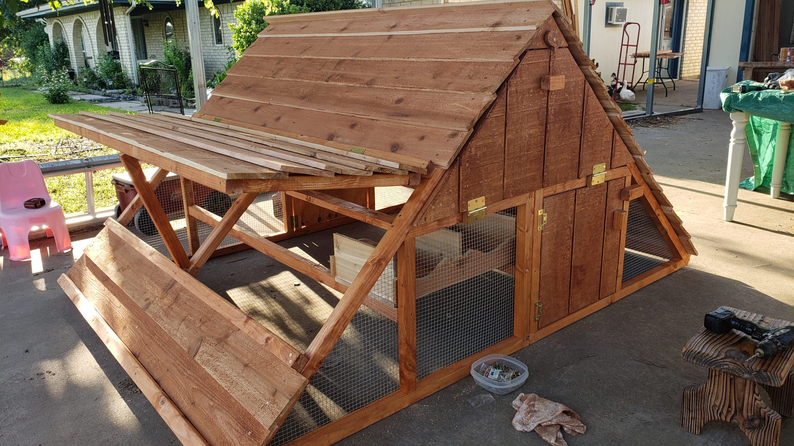 coop_alphonse_door_propped_driveway Alphonse 6'x6' Chicken Coop with door propped open